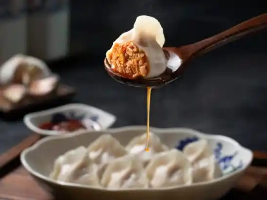 Poached Spicy Pork and Shrimp Dumplings